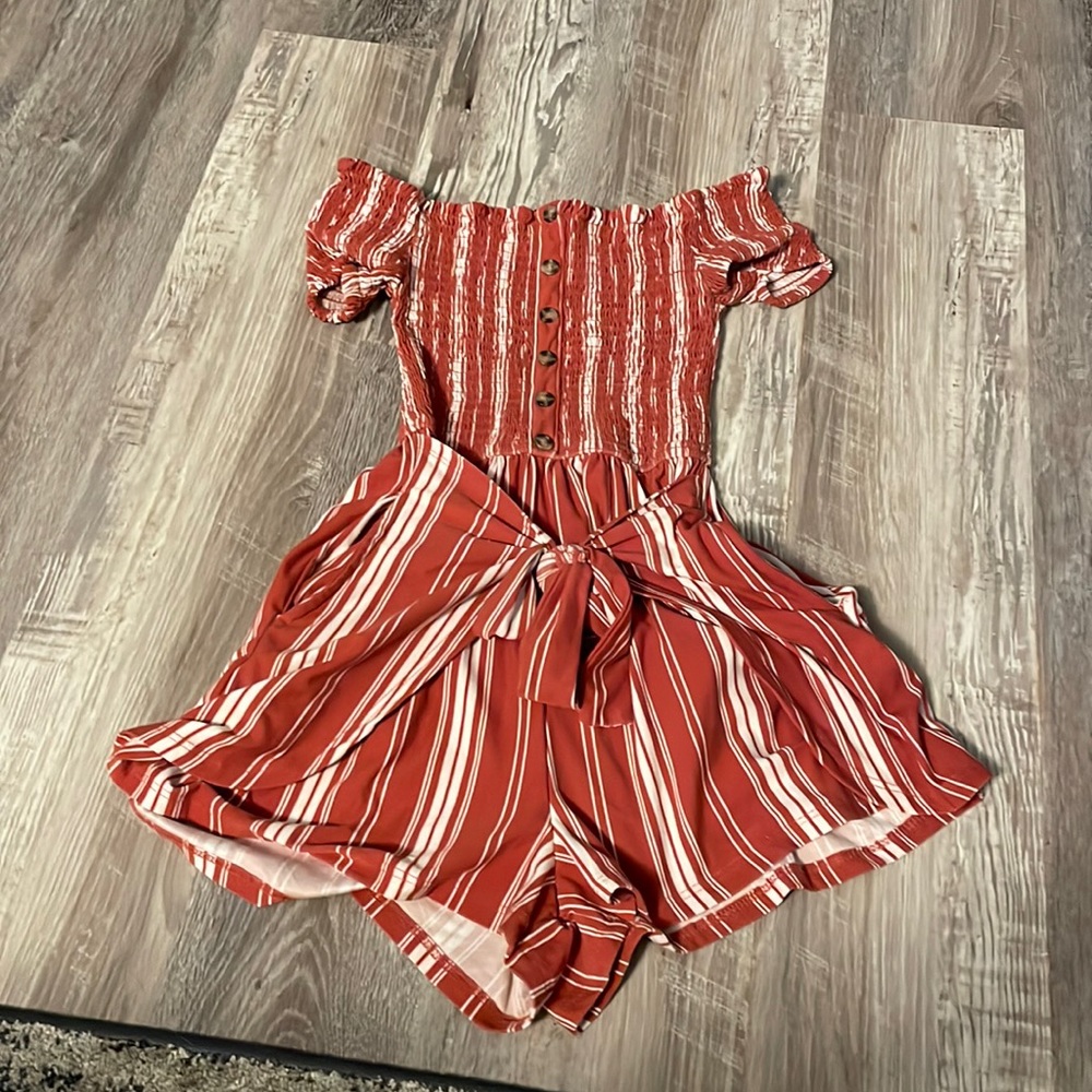 Rue 21 XS off the shoulder romper with pockets and it ties in the front